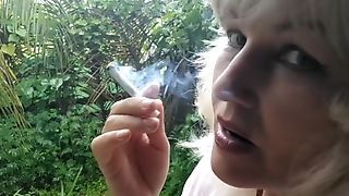 Raining Half Nude Blonde Bitch Smoking In Garden Outdoor